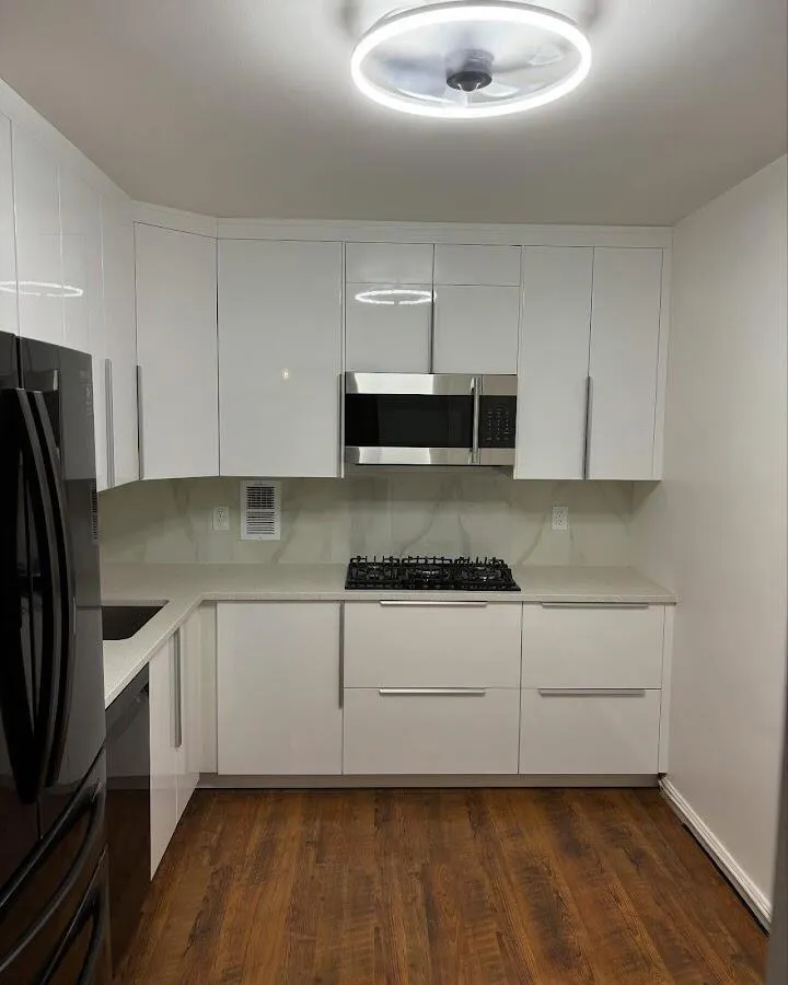 Renovated kitchen with quartz countertops in Marshfield